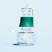 The Deconstructed Mini bong render in forest green, light blue background